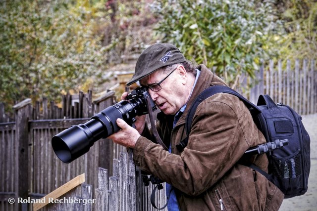 Der Fotograf mit dem langen Rohr